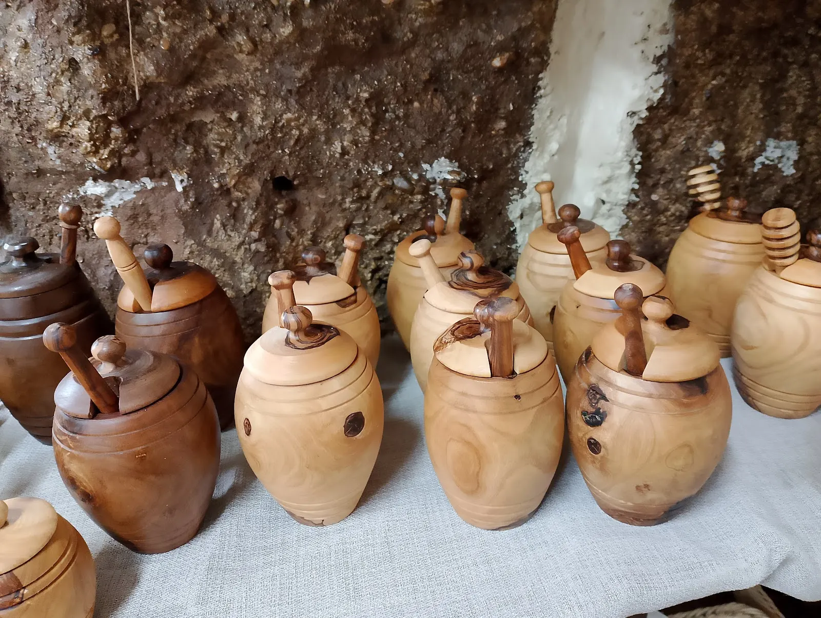 A row of honey pots